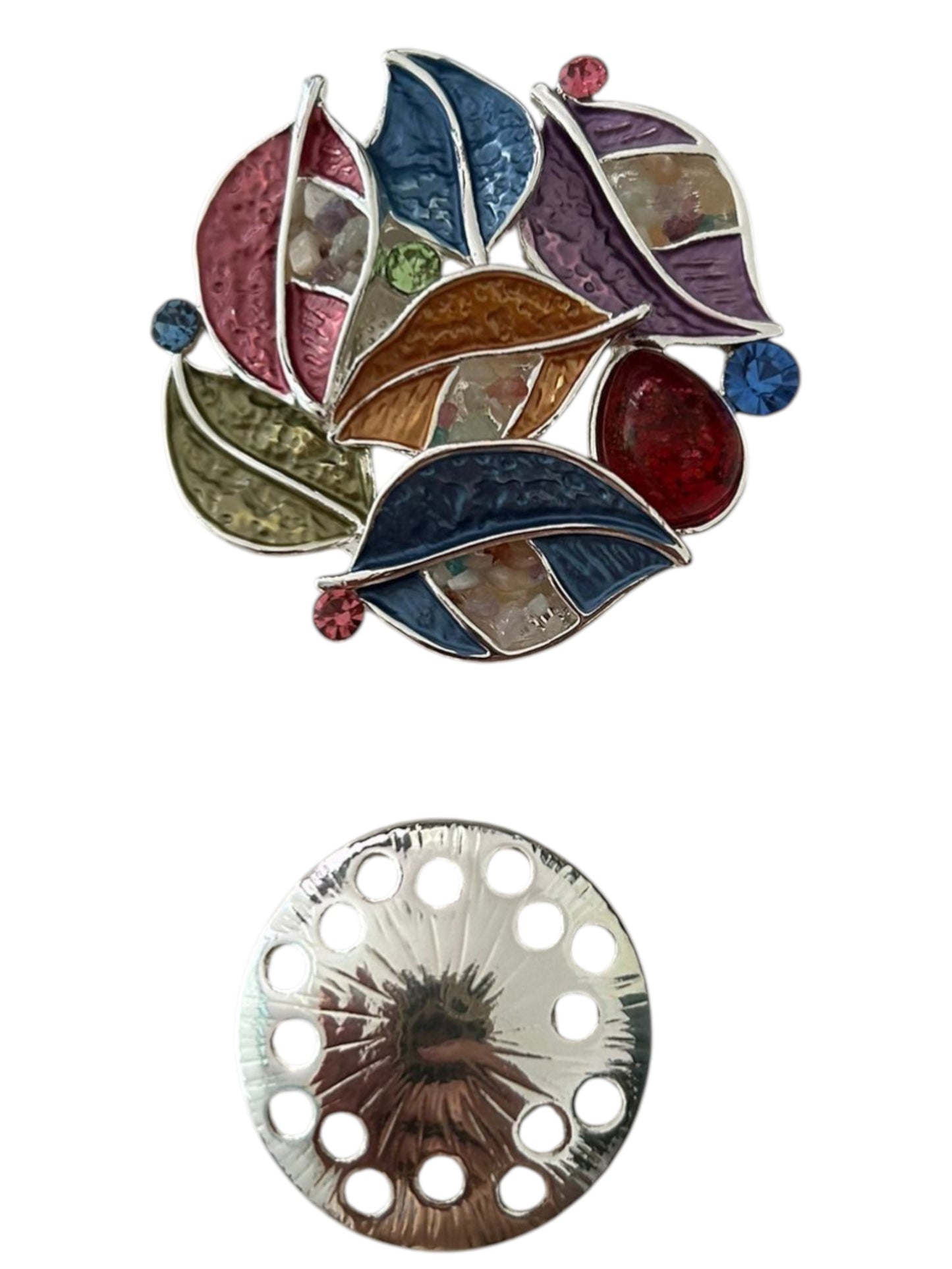 Magneetbroche Nr.47 Kleurrijke Bladcompositie met speelse bladeren in blauw, rood, paars en groentinten met zilverkleurige details.