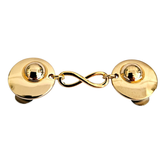 Goudkleurige vestclip met infinity-symbool – staat voor verbondenheid en sluit uw vest stijlvol zonder schade aan de stof

