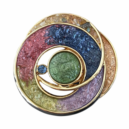 Magneetbroche Nr.13 Gekleurde Harmonie Cirkel met kleurrijke cirkelvormen, een groen middelpunt en verfijnde goudkleurige accenten.
