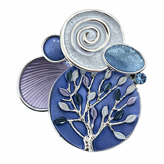 Magneetbroche Nr.41 Blauwe Kracht Levensboom met levensboommotief, blauwe tinten en sierlijke ronde vormen voor een elegante uitstraling.
