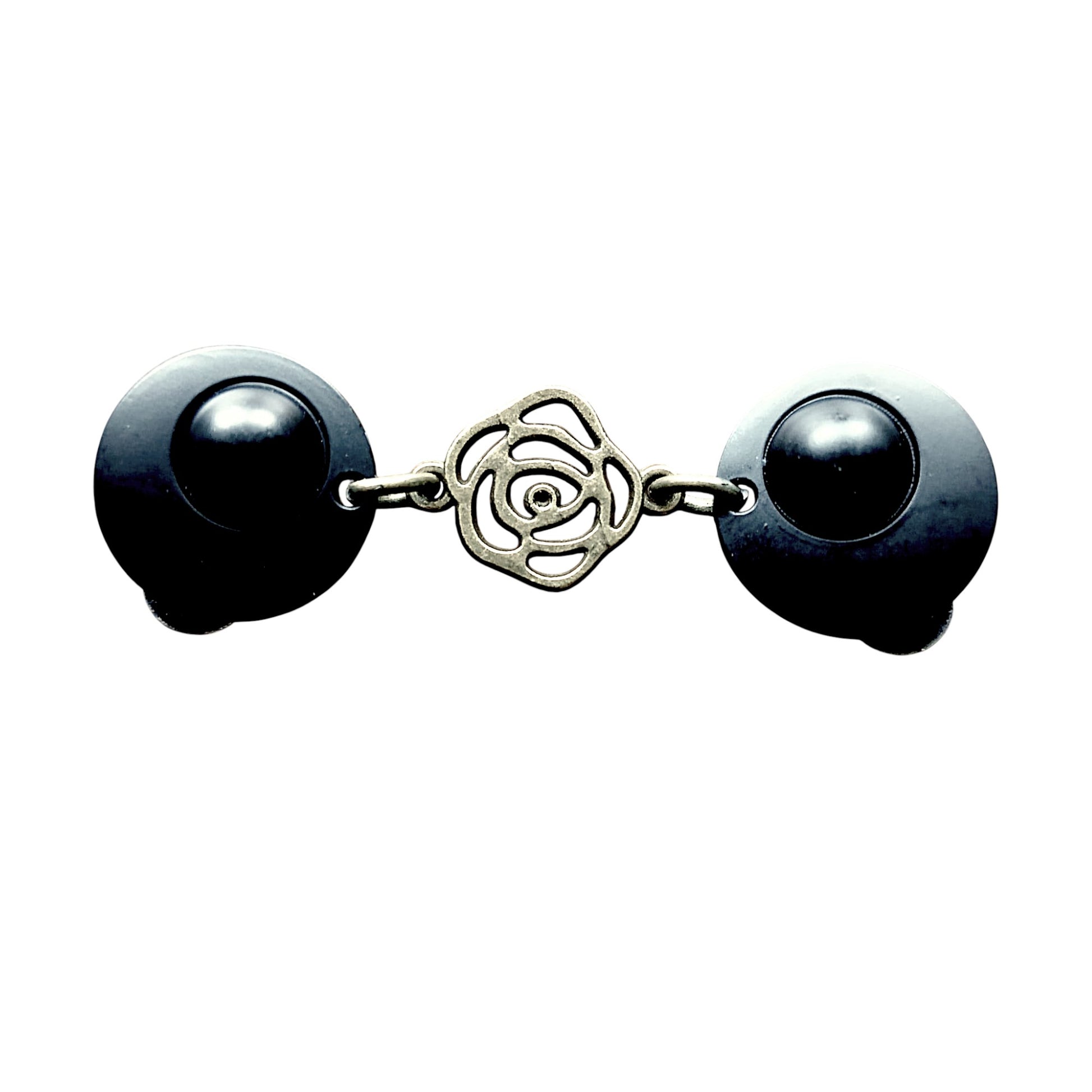 “Fashionclip met zwarte ronde clips en zilverkleurige open roos als middenstuk, elegante en tijdloze uitstraling.”